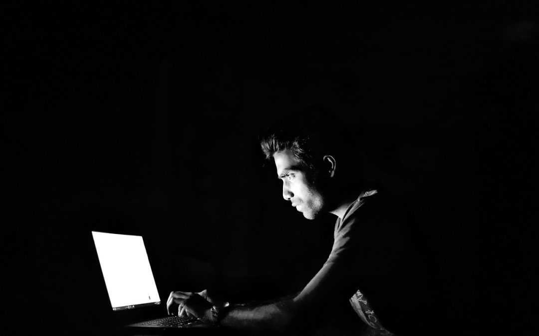 Man looking at laptop